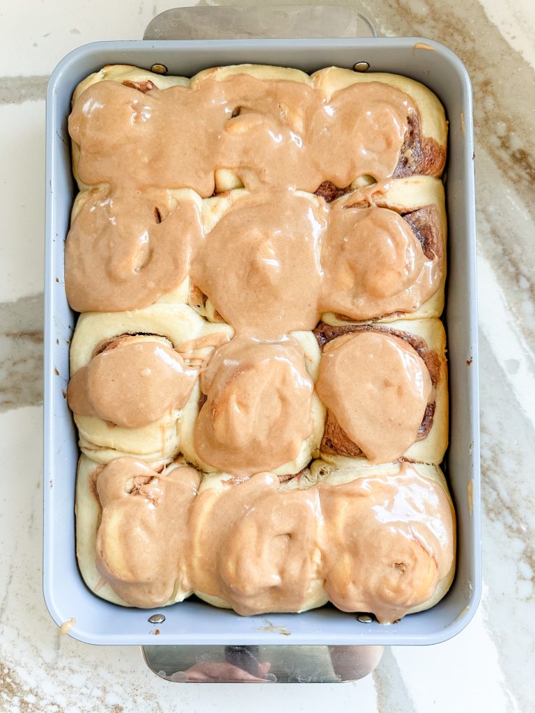 peanut butter frosting spread on the rolls