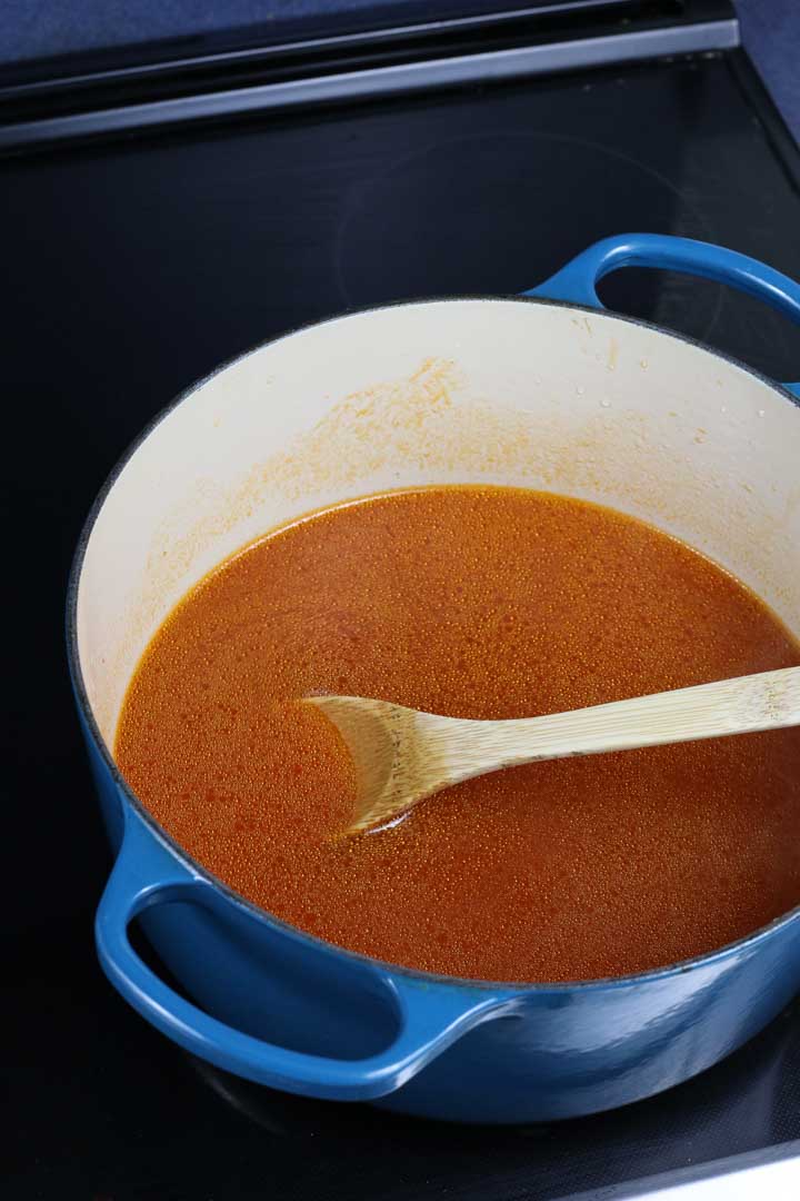 Mixing tomato paste and water