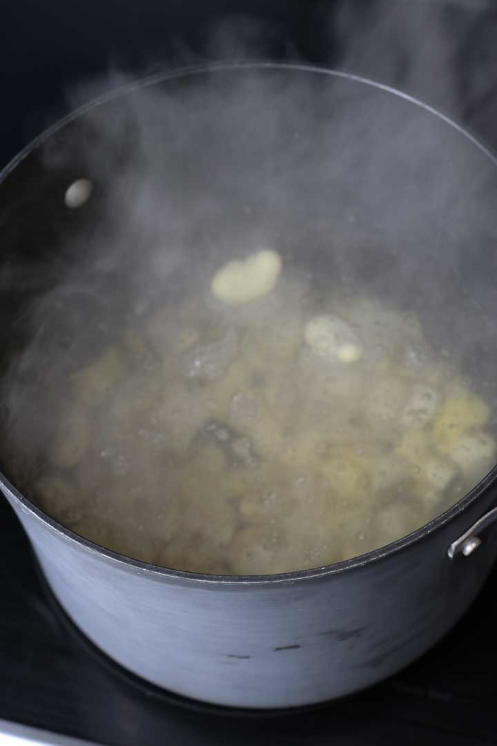Boiling water with fava beans