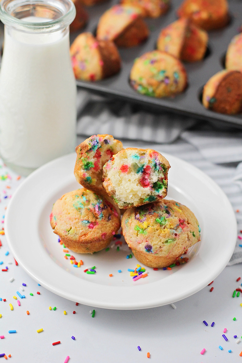 These colorful sprinkle mini muffins are tiny, adorable, and delicious. They're perfect for snacks or school lunches!