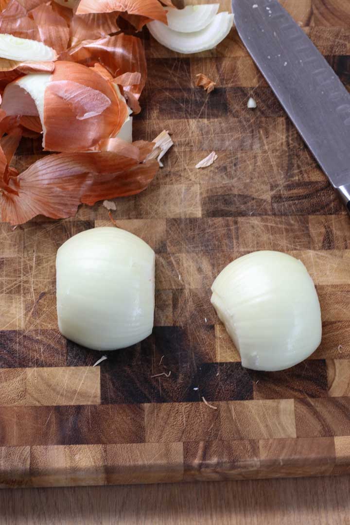 Medium onion, halved and ends removed.